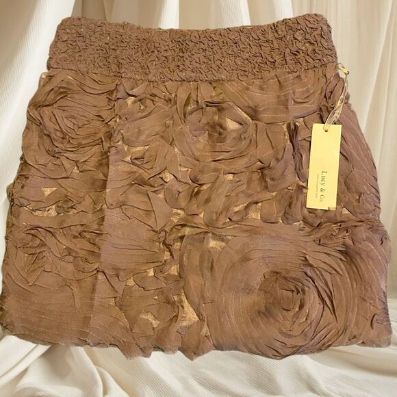 Lucy Dresses & Skirts - Lucy & Co. 3D Rosette lace mini skirt | Beige rosette ruffle skirt NWT size M